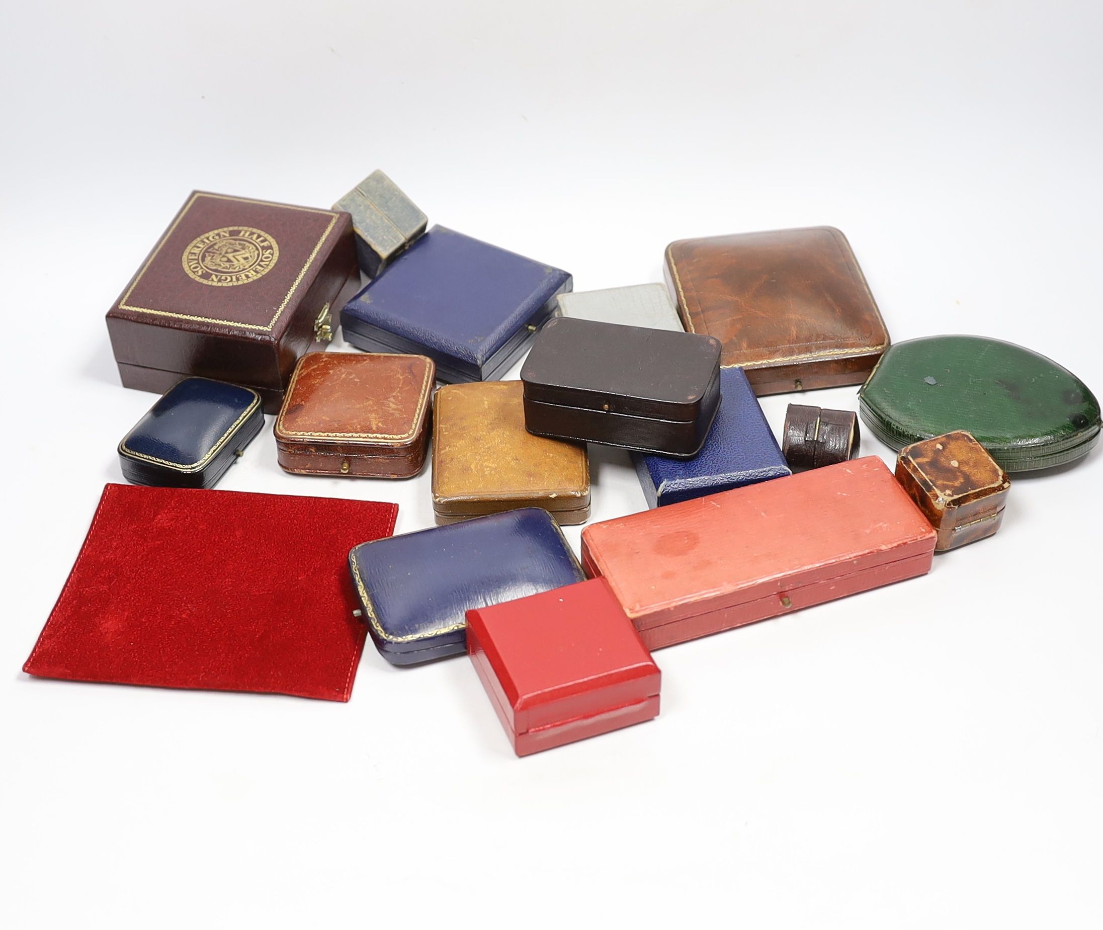 Fourteen assorted jewellery boxes including Garrard and three other similar items including a Cartier pouch.